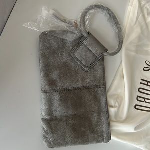 HOBO brand new sable wristlet.  Still wrapped in plastic- color- olive oil